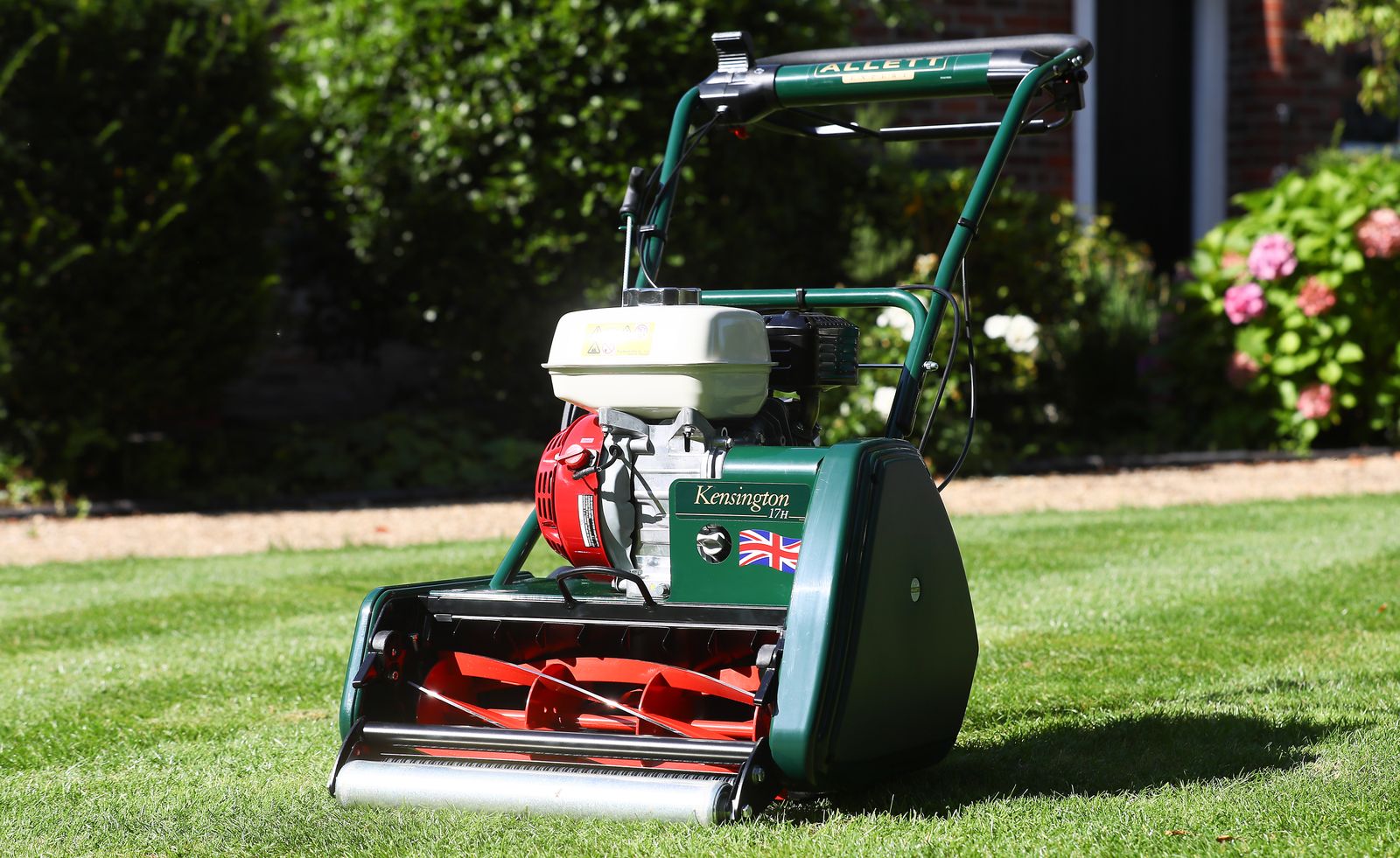 Close up of a mower cutting grass